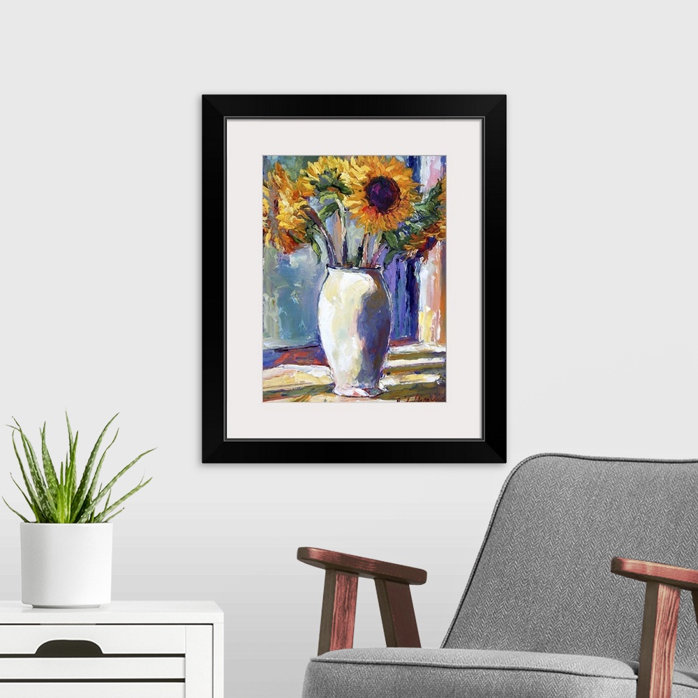 A modern room featuring Contemporary colorful painting of sunflowers.