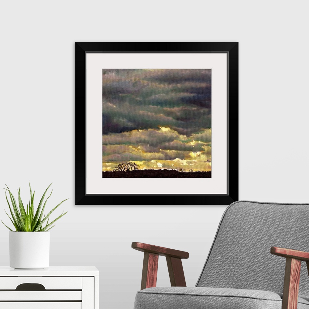 A modern room featuring Contemporary painting of a sky with layers of ominous looking clouds.