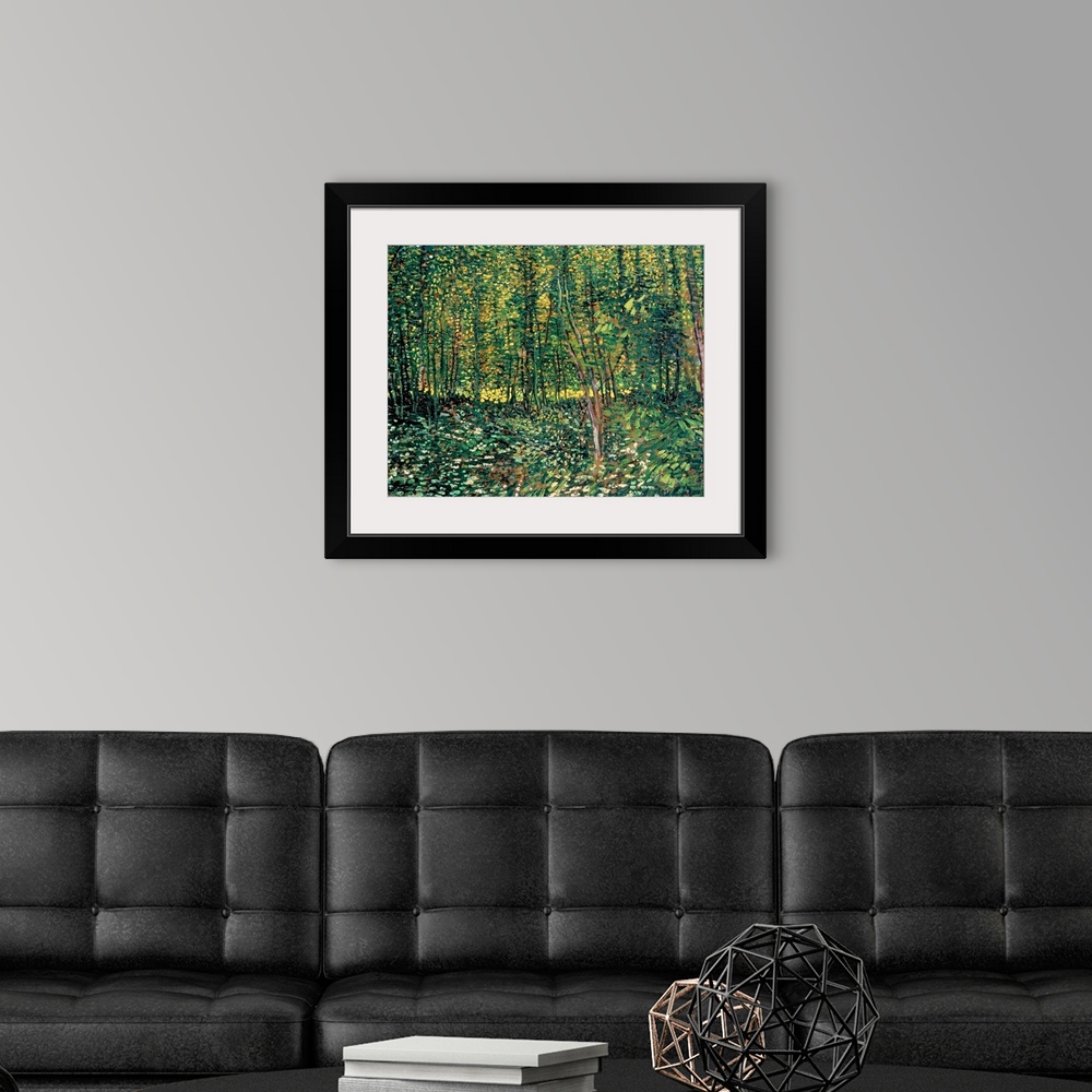A modern room featuring Large classic art depicts a lush forest filled with trees and shrubbery through the use of an abu...