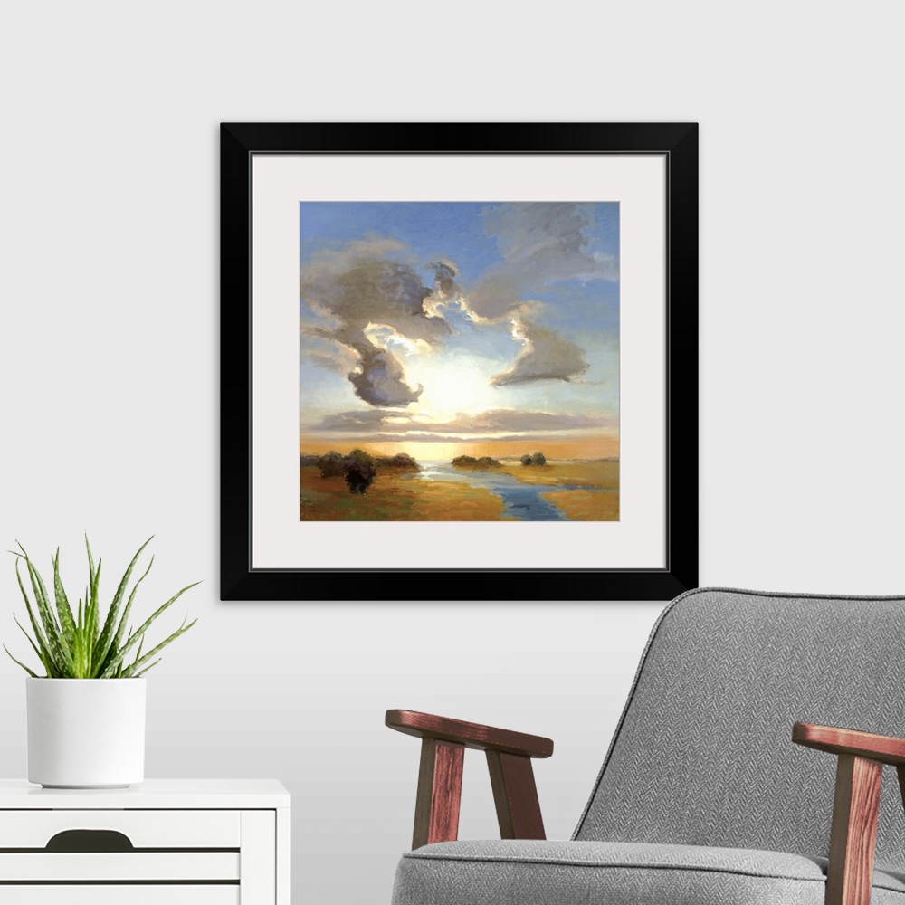 A modern room featuring Square painting of a steam cutting through the landscape with large clouds in the sky above.