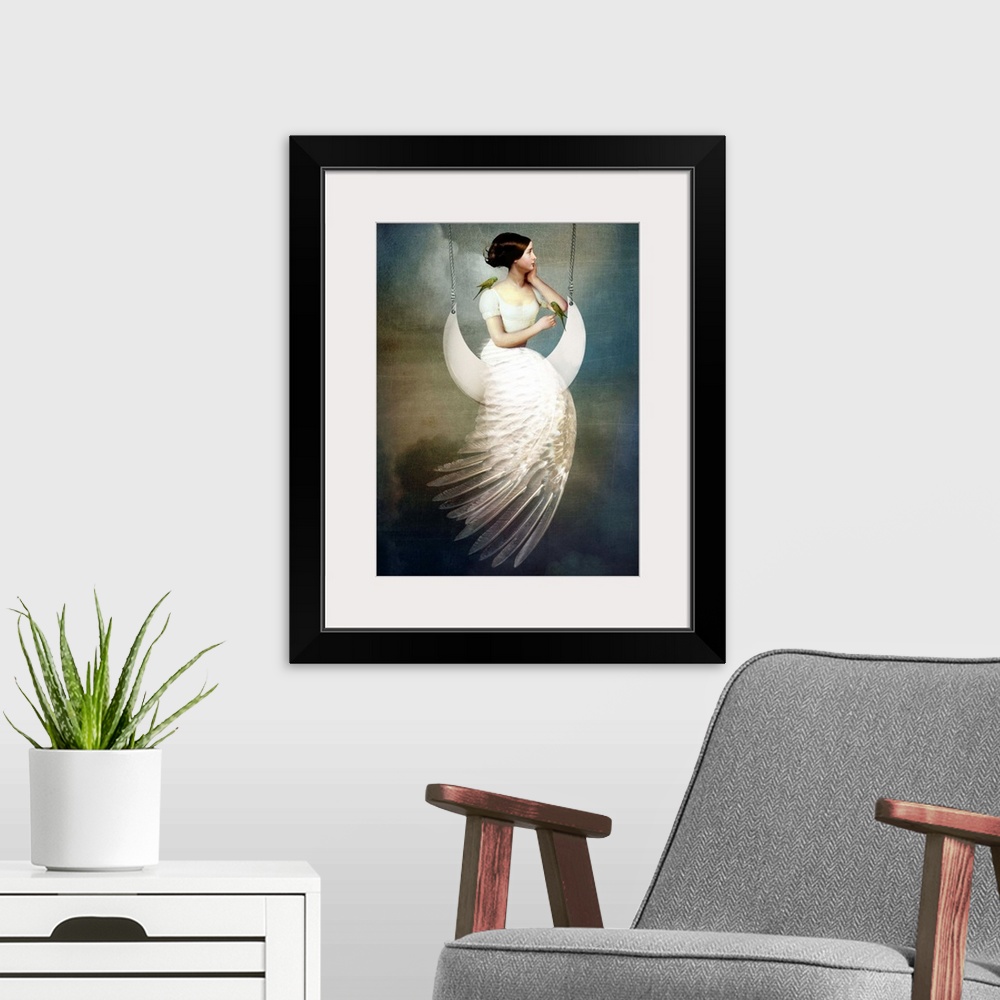 A modern room featuring A conceptual portrait of a female with a feather dress sitting on a moon swing.