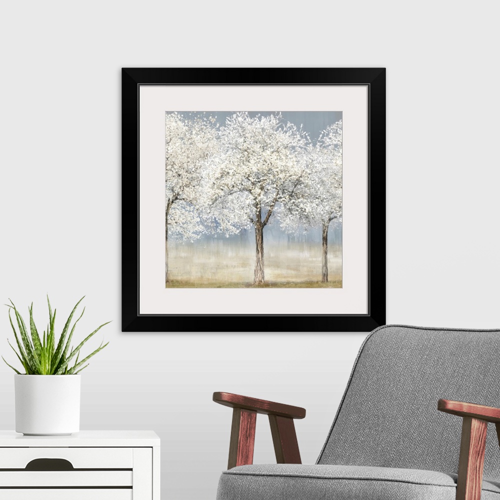 A modern room featuring A contemporary painting of a small stand of trees covered in white spring blossoms. The trees sta...