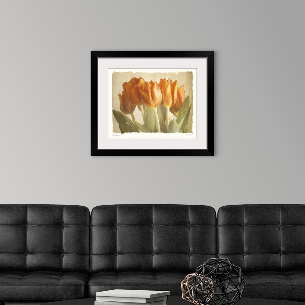 A modern room featuring Soft painting of tulips in the middle of a neutral canvas.