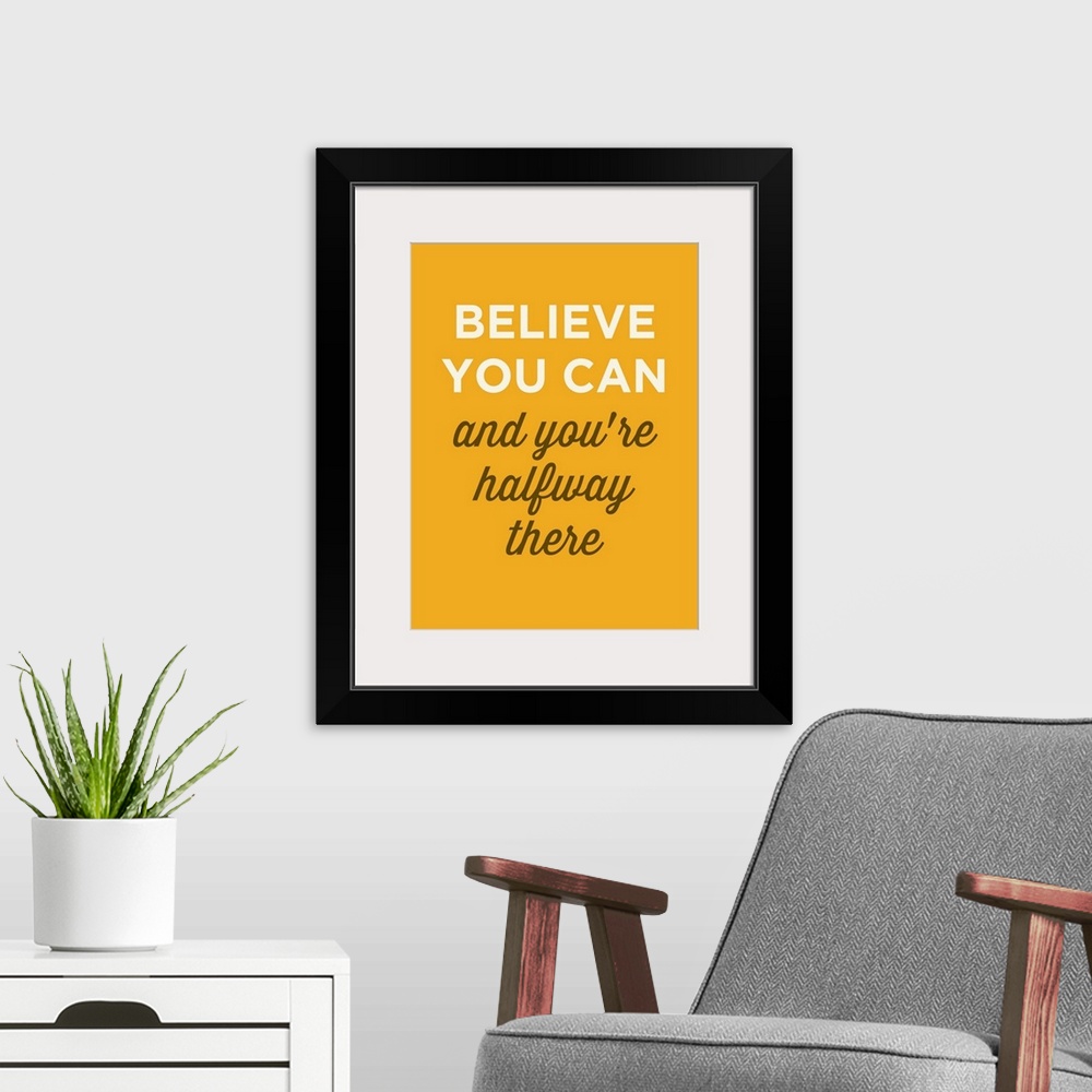 A modern room featuring "Believe You Can And You're Halfway There" on yellow background.