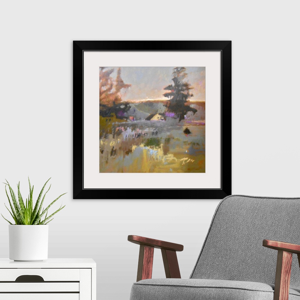 A modern room featuring Colorful contemporary landscape painting using muted tones.