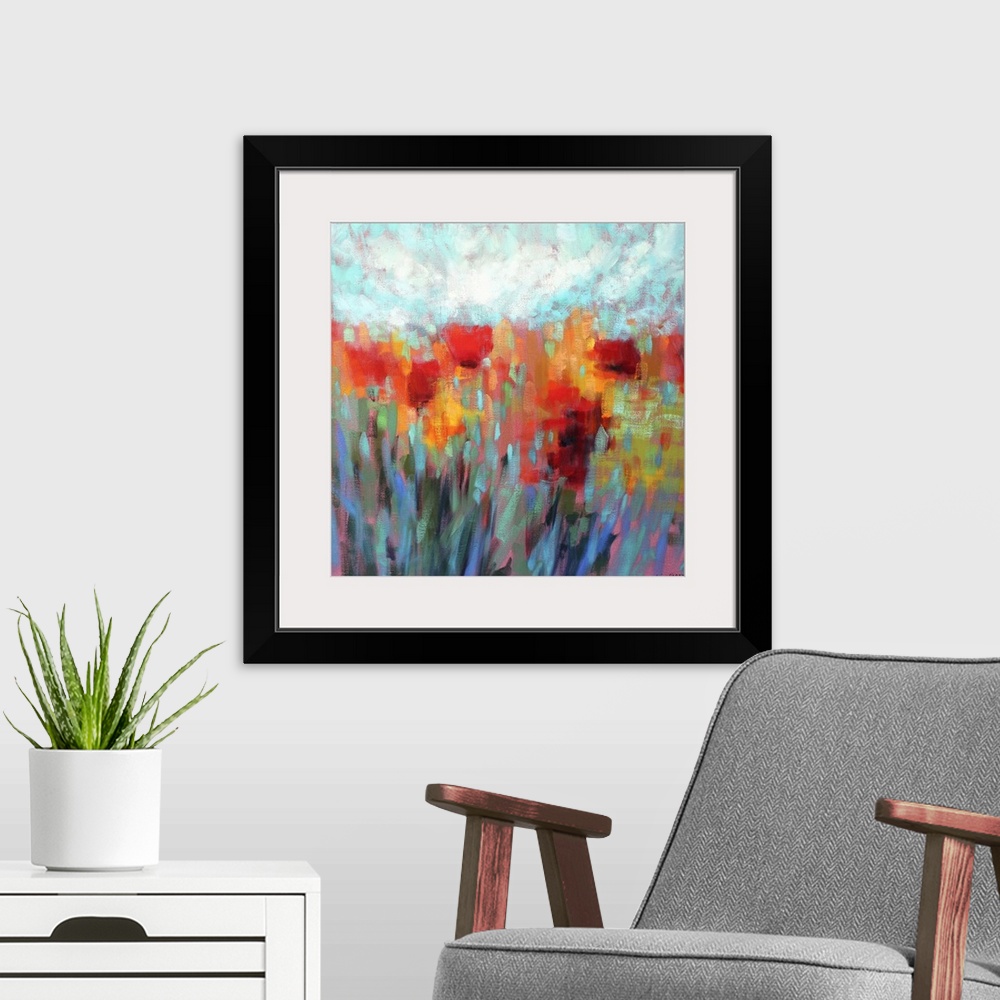 A modern room featuring A colorful contemporary painting of a field of flowers.