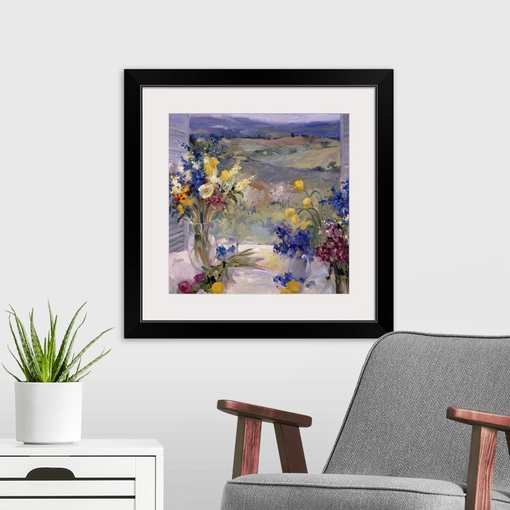 A modern room featuring Fine art oil painting still life of lavender, yellow and maroon flowers on a table overlooking th...