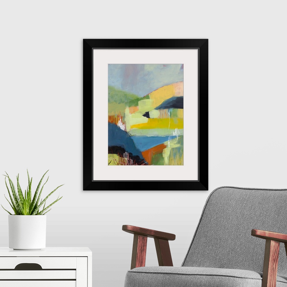 A modern room featuring Vibrant abstract landscape with rolling hills created with patchwork-like brushstrokes and layering.