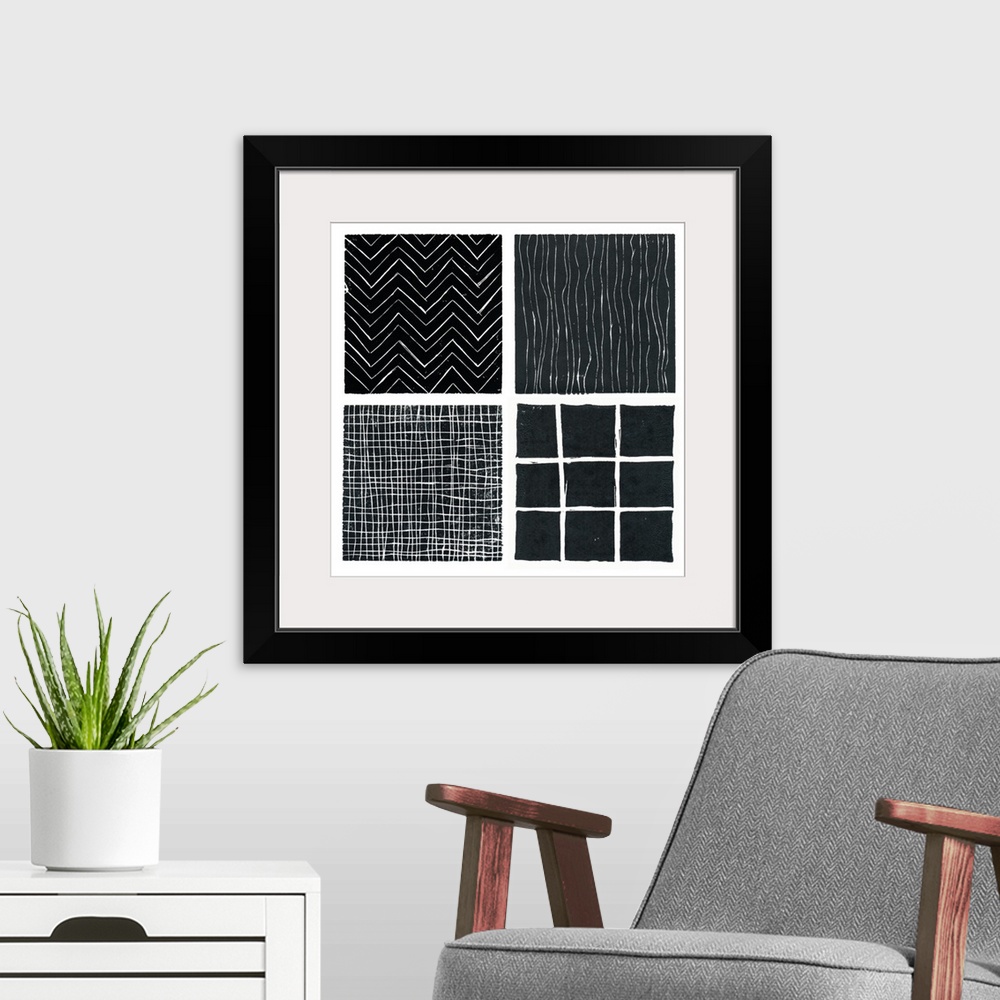 A modern room featuring Four b/w prints done with lino blocks and grouped as a single print.