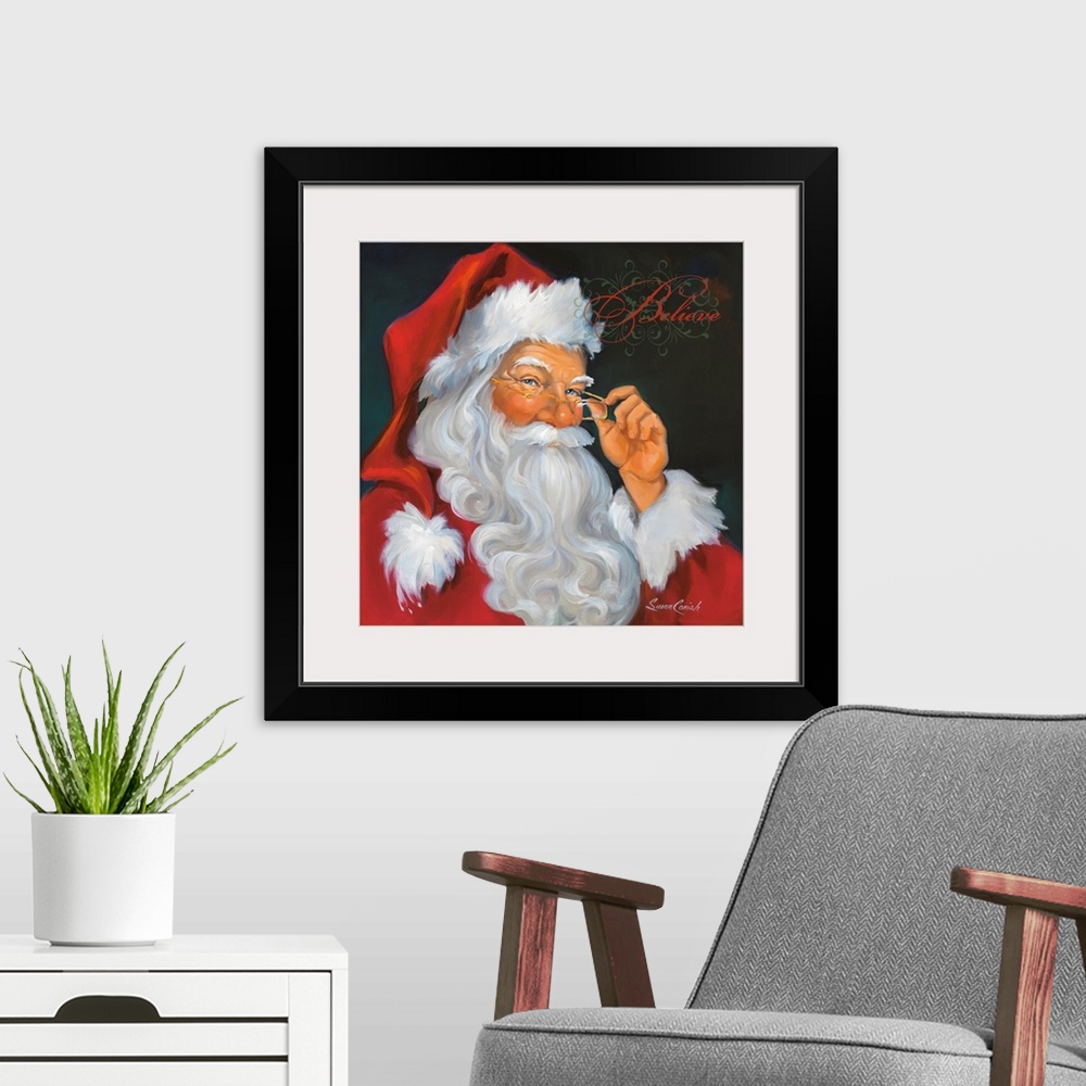 A modern room featuring Fine art painting of Santa Claus in a red suit with the word "Believe"  above his head.