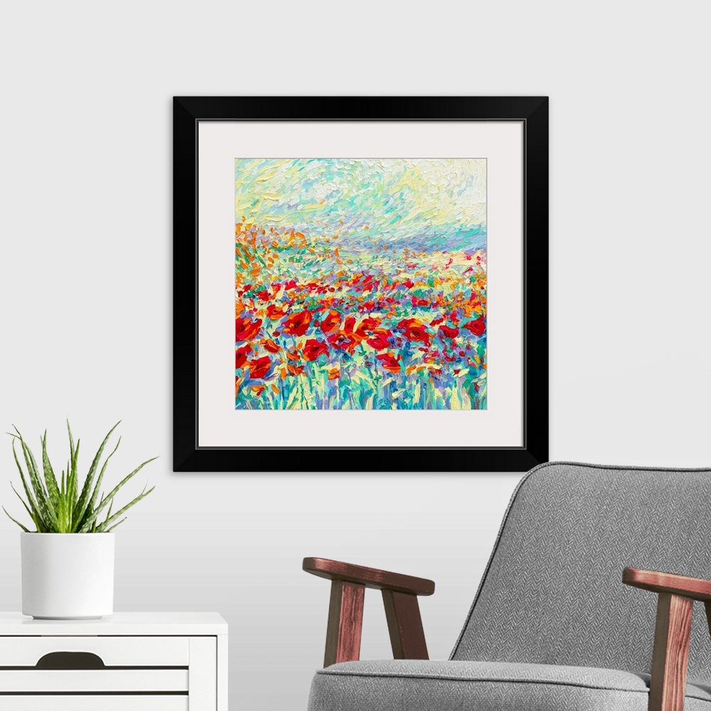 A modern room featuring Brightly colored contemporary artwork of a field of red poppies.