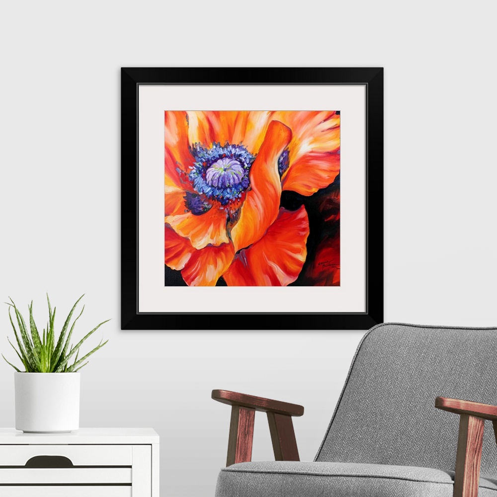 A modern room featuring A floral abstract of a red poppy on a square canvas.