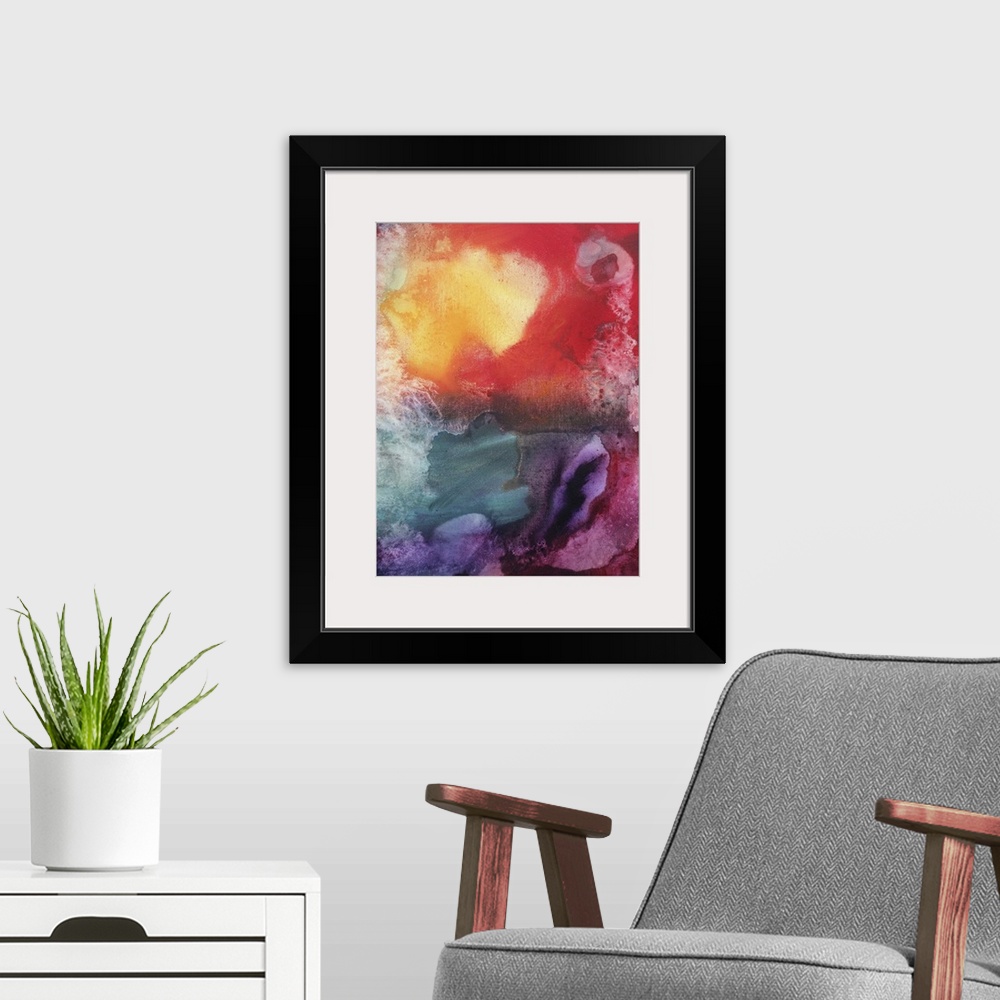 A modern room featuring Abstract artwork that is filled with fluid colors of reds, yellows, magenta, violet and blue acce...