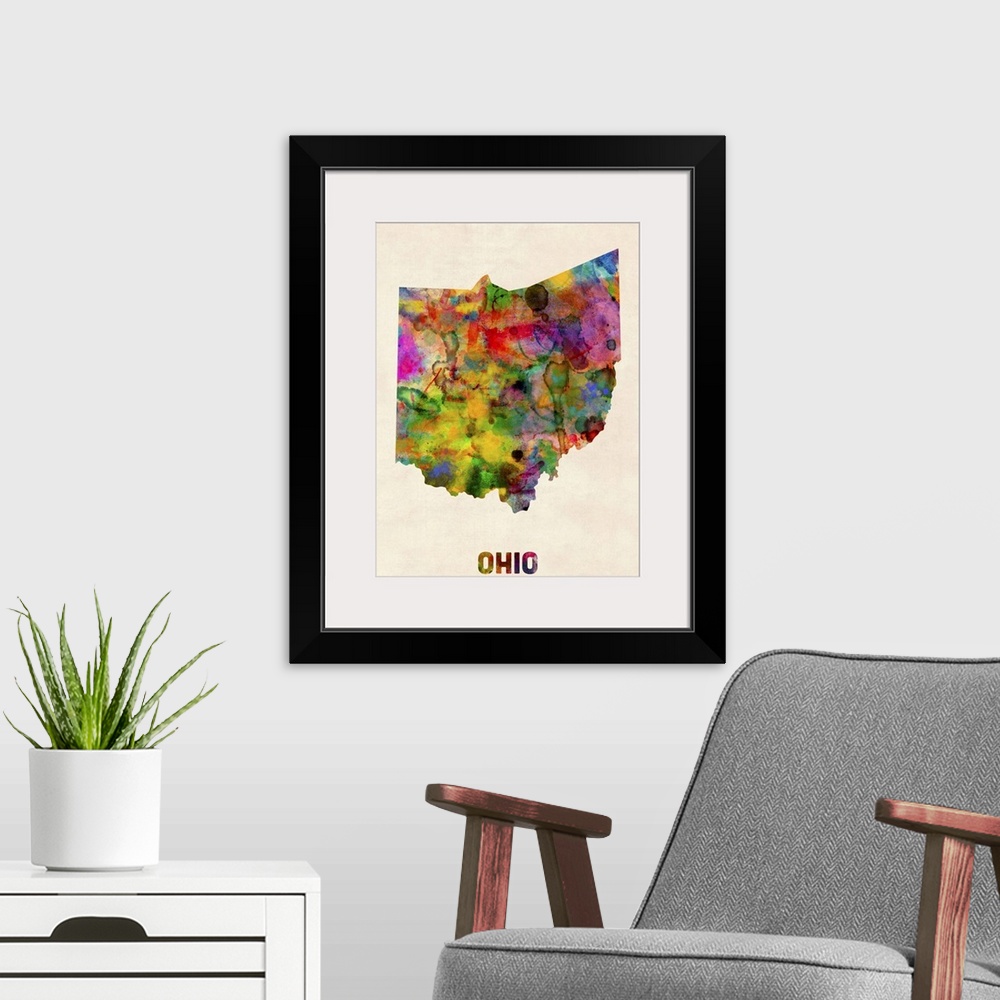 A modern room featuring Contemporary piece of artwork of a map of Ohio made up of watercolor splashes.