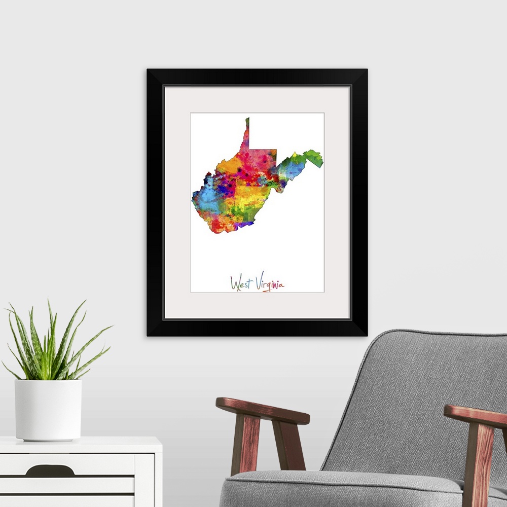 A modern room featuring Contemporary artwork of a map of West Virginia made of colorful paint splashes.