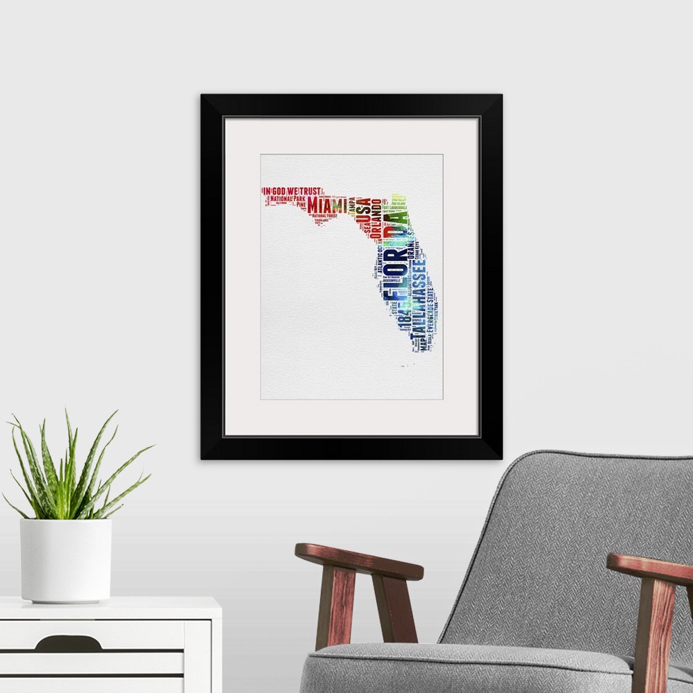A modern room featuring Watercolor typography art map of the US state Florida.
