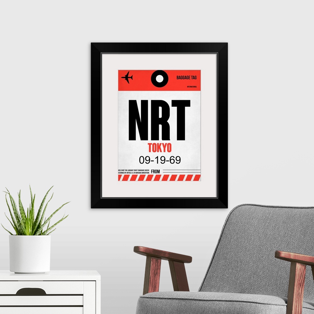 A modern room featuring NRT Tokyo Luggage Tag I