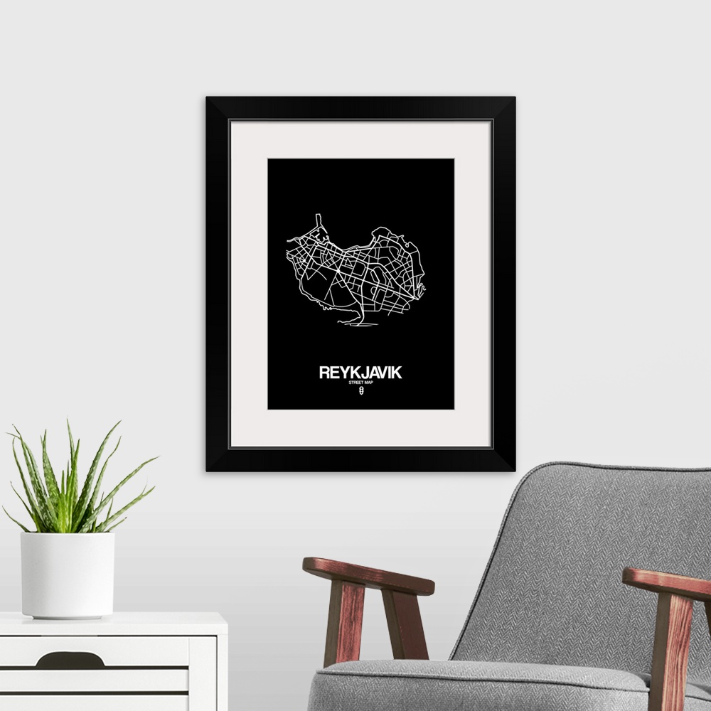 A modern room featuring Minimalist art map of the city streets of Reykjavik in black and white.