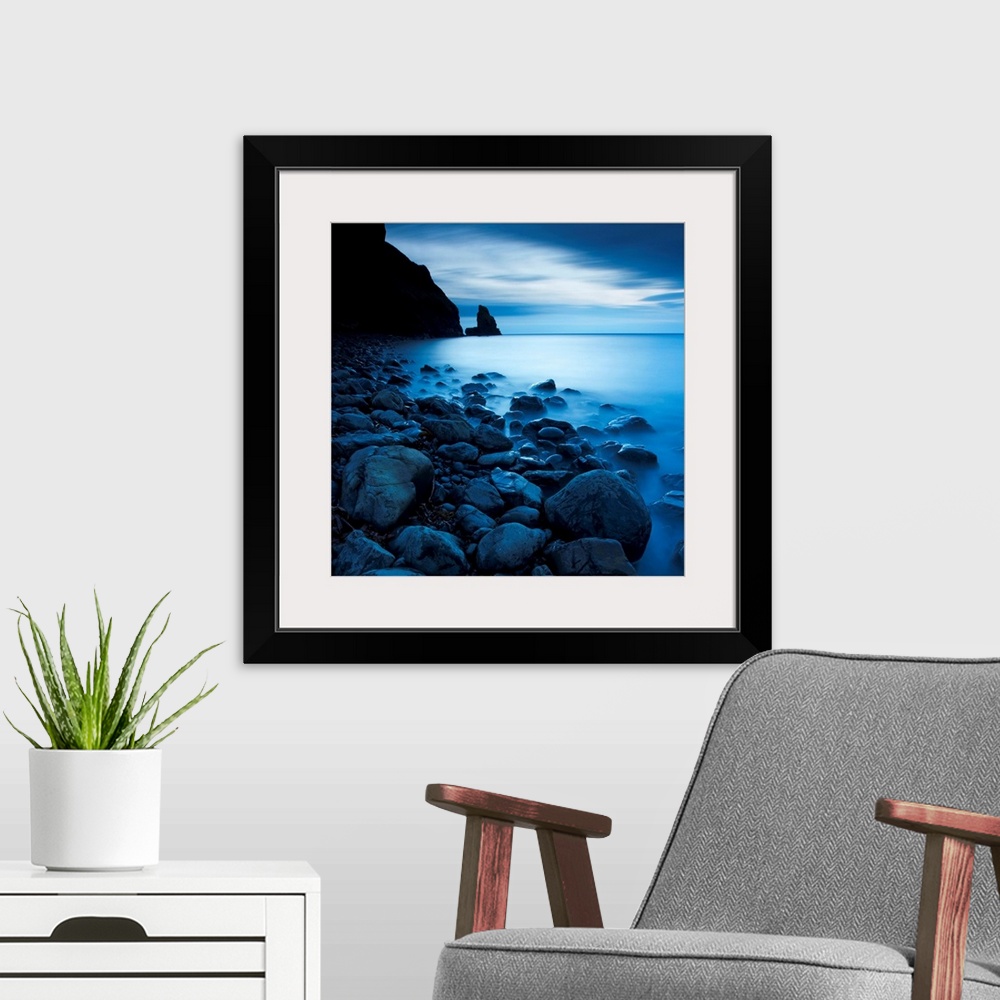 A modern room featuring This is a vertical landscape photograph of fog and water on rocky beach that would make great hug...