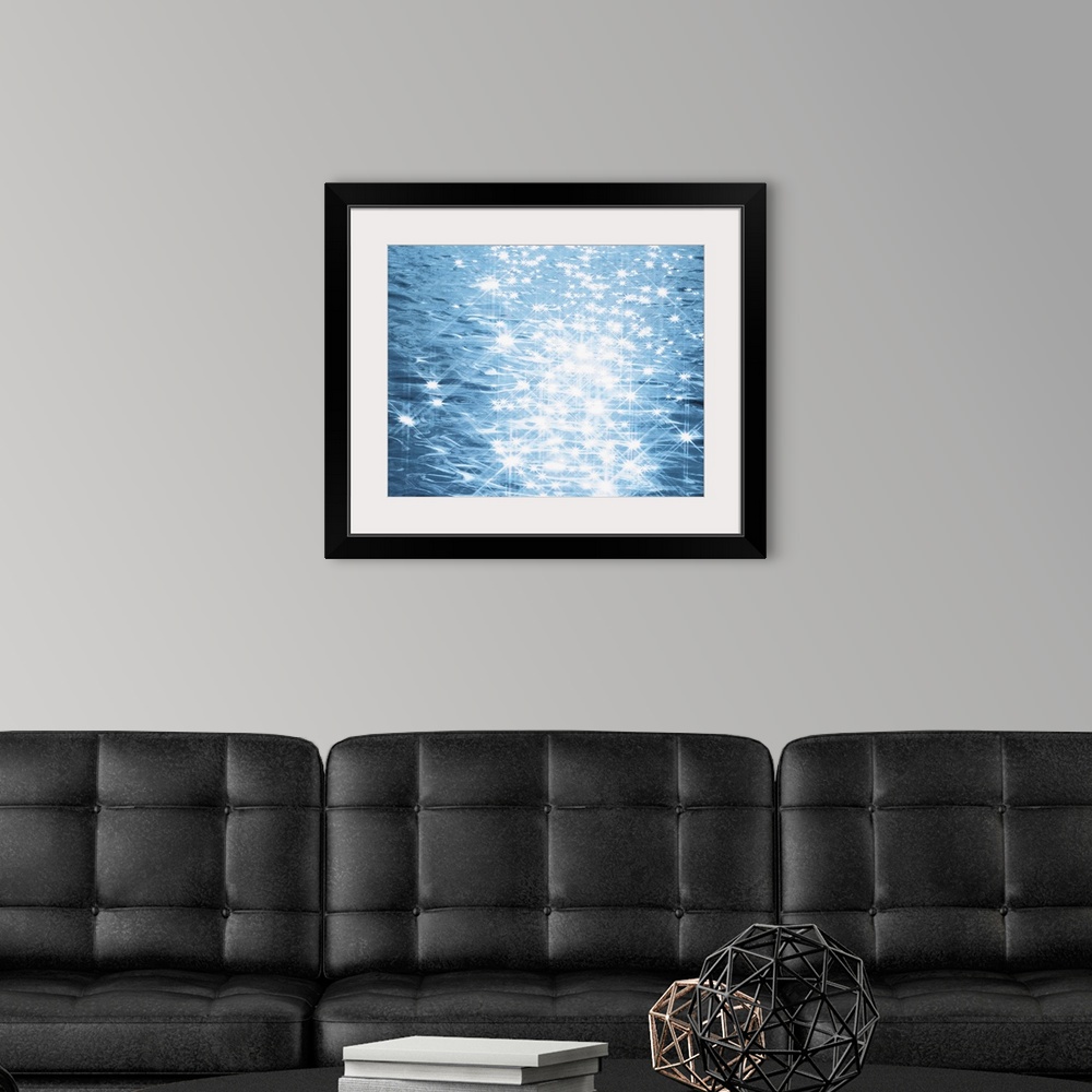 A modern room featuring Abstract blue water background with sparks