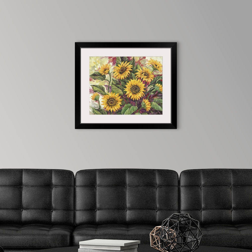 A modern room featuring Painting of an arrangement of sunflowers of different sizes.