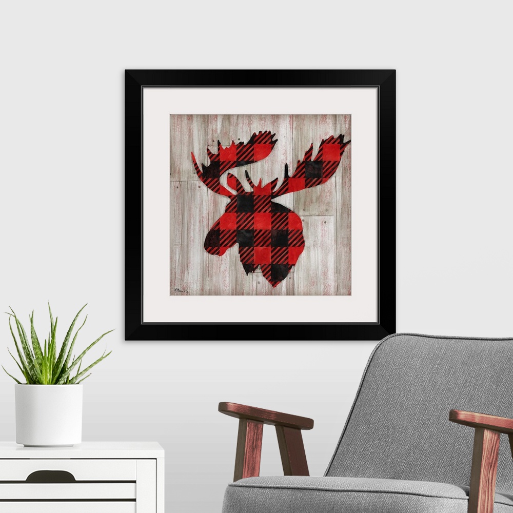 A modern room featuring Square cabin decor with a red and black flannel patterned silhouette of a moose on a faux distres...