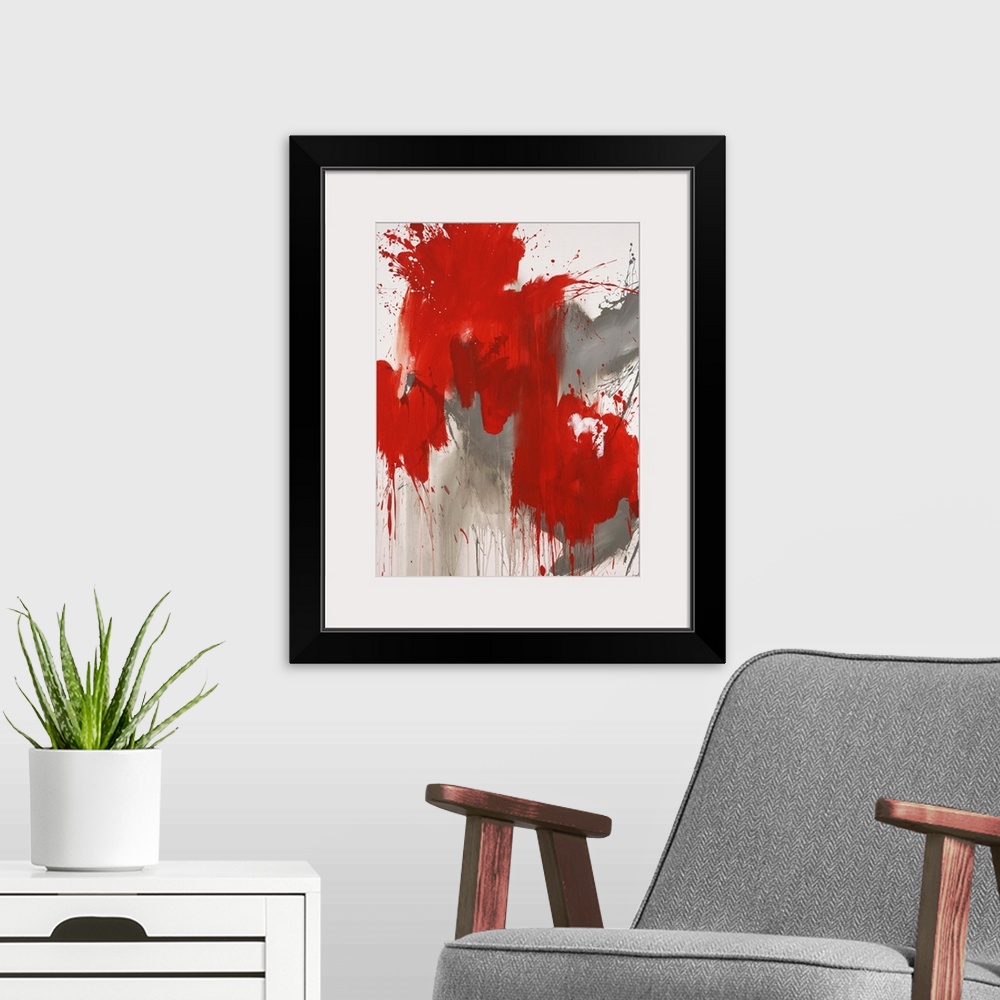 A modern room featuring Contemporary abstract painting of a giant red splash of paint smeared and splattered against a ne...