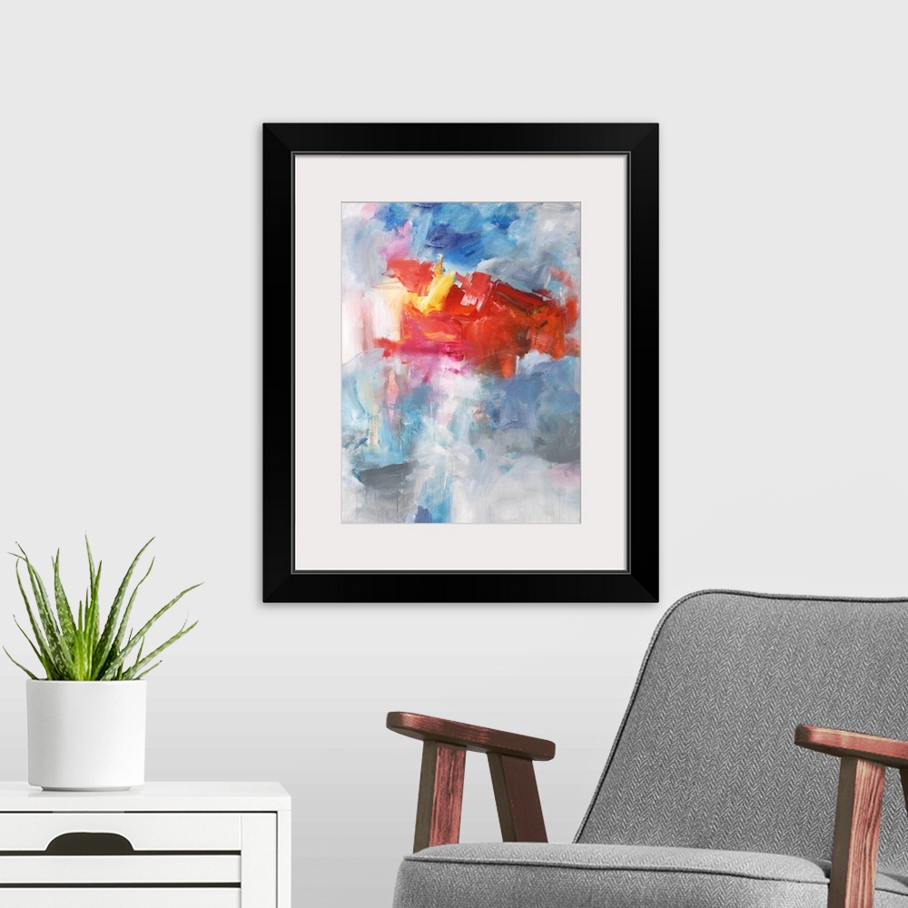A modern room featuring Contemporary abstract painting using bright red tones over a mixture of blue tones over gray.