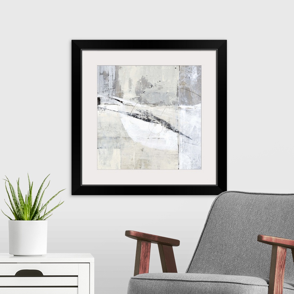A modern room featuring Square contemporary abstract painting with sections of gray, white, and tan hues with thin, black...