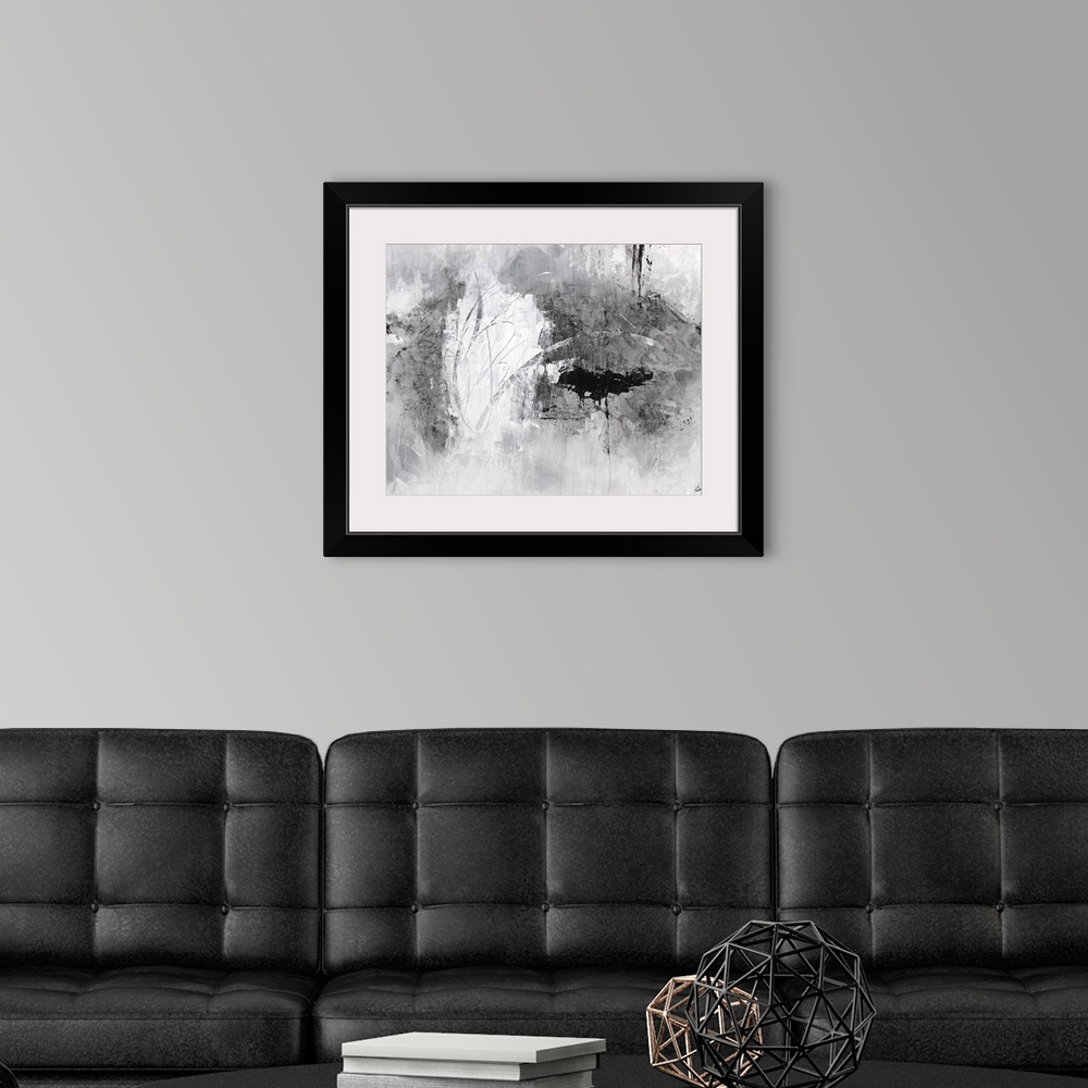 A modern room featuring Contemporary abstract artwork in gritty shades of white and grey.