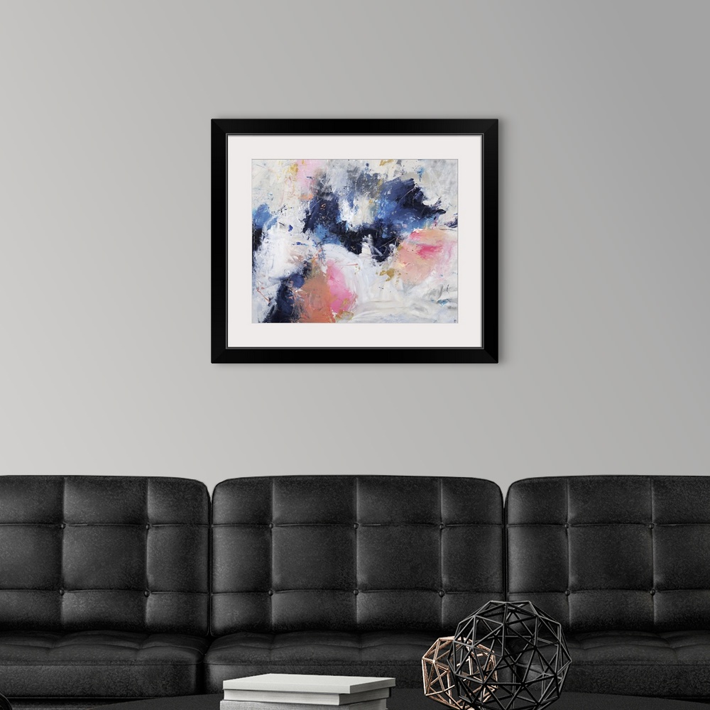 A modern room featuring Abstract painting with coll bursts of blue surrounded by warm bursts of pink on a gray toned back...