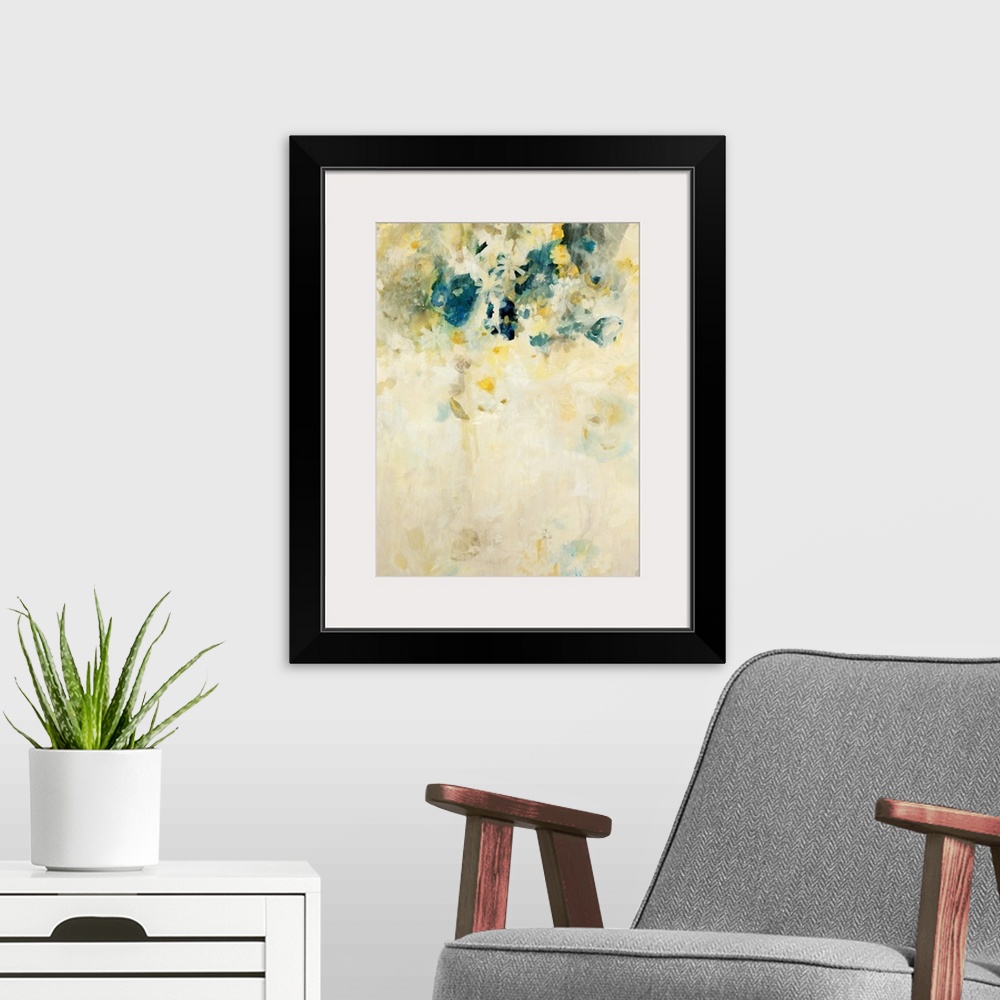 A modern room featuring Vertical, large home art docor of many small, golden flowers trickling downward and then fading i...