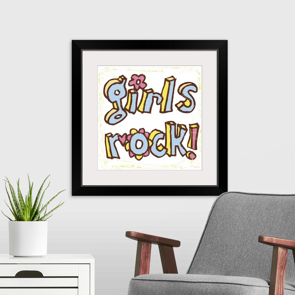 A modern room featuring The words "Girls Rock" handwritten in pen and ink.