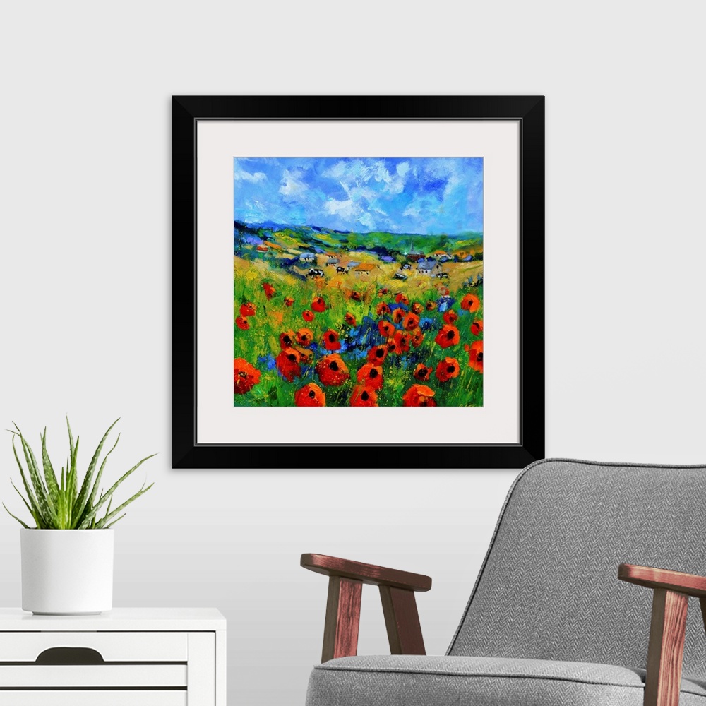 A modern room featuring Contemporary abstract painting of a bright field of poppies.
