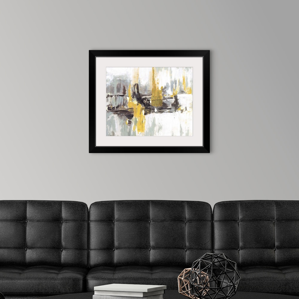 A modern room featuring Contemporary abstract artwork in black and white embellished with bright yellow areas.