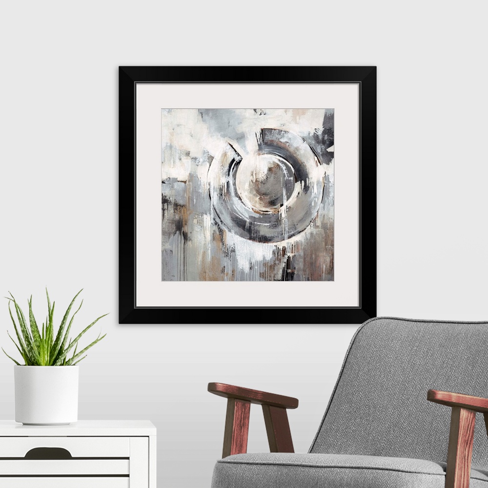 A modern room featuring Abstract painting in neutral and earth tones of a large circular shape surrounded by dripping pat...