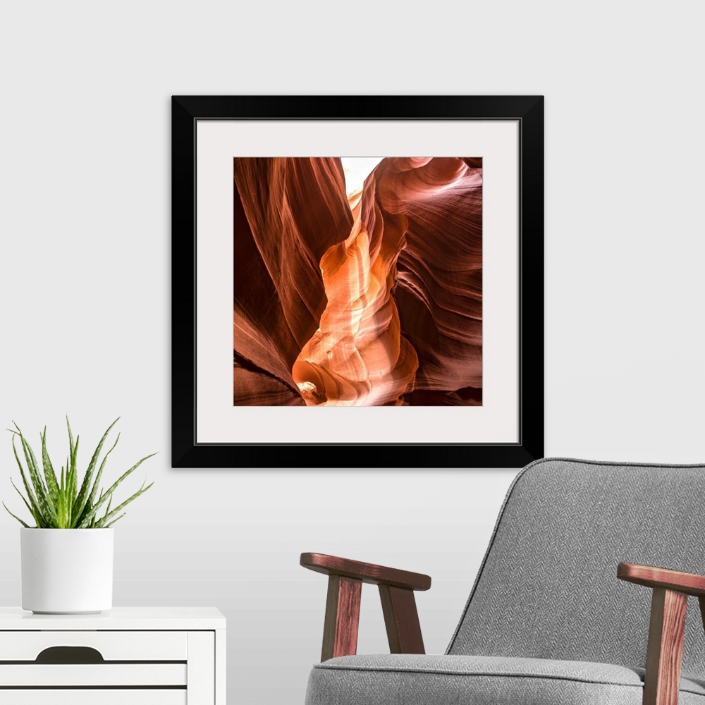 A modern room featuring Square photograph inside of Antelope Canyon rock formation located on the Navajo Reservation in P...