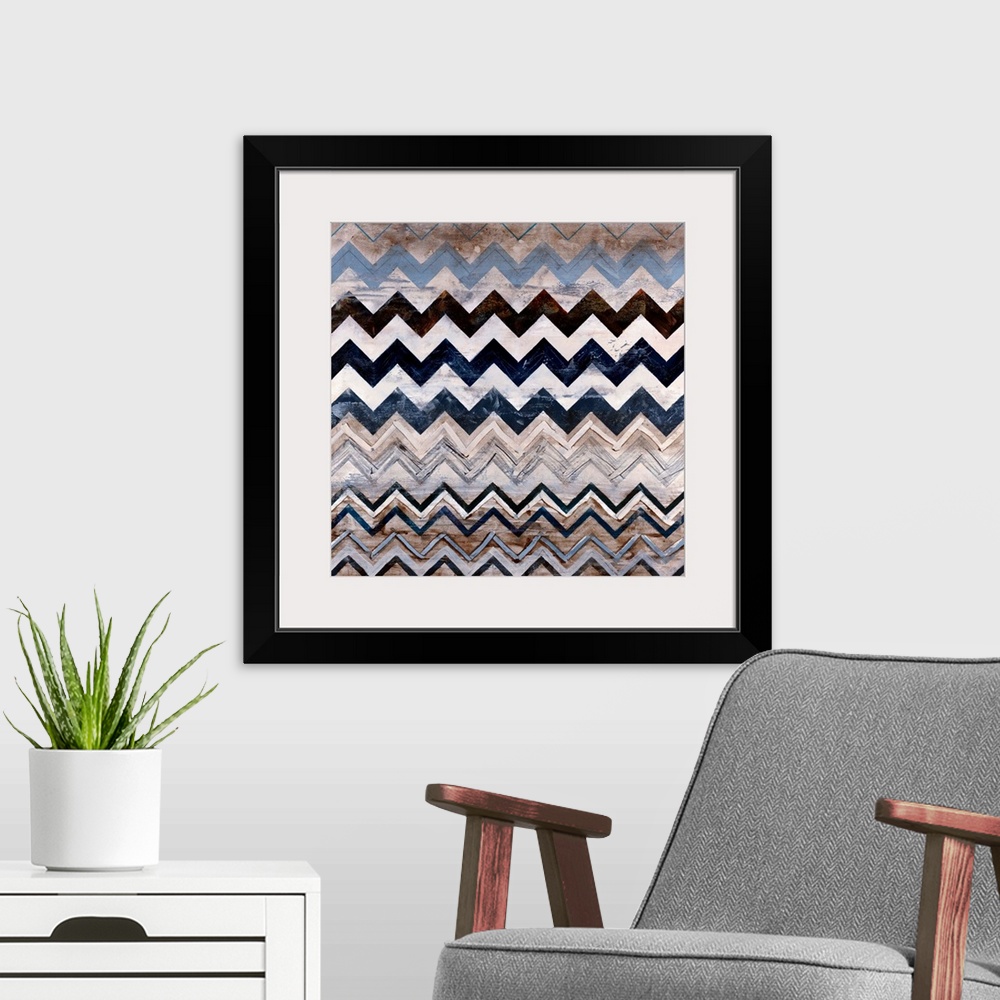 A modern room featuring Abstract contemporary painting of a triangular pattern done in neutral earth tones on a square ca...