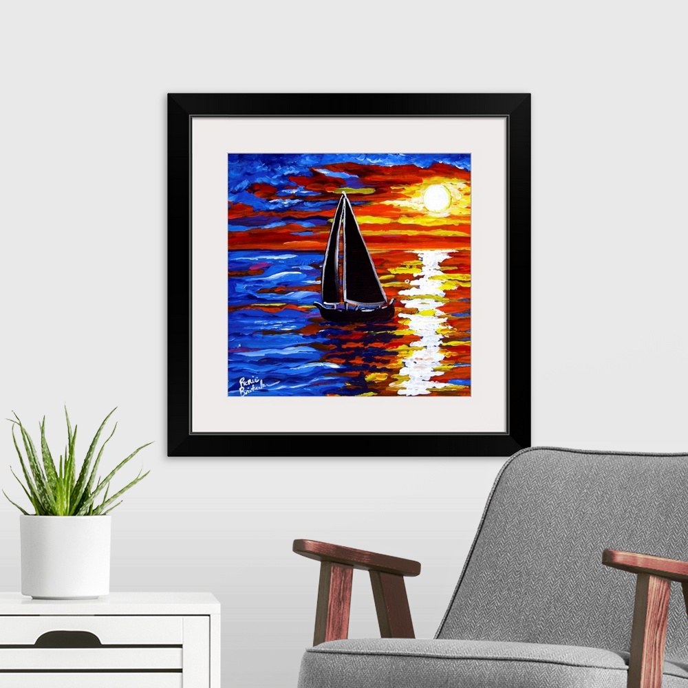 A modern room featuring Brilliant sunset reflects in the water where a sailboat drifts by.