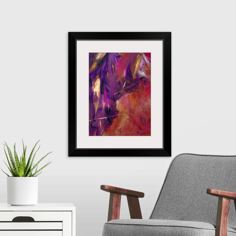 A modern room featuring Abstract painting using shades of red, pink, purple, black, and orange with small hints of bright...