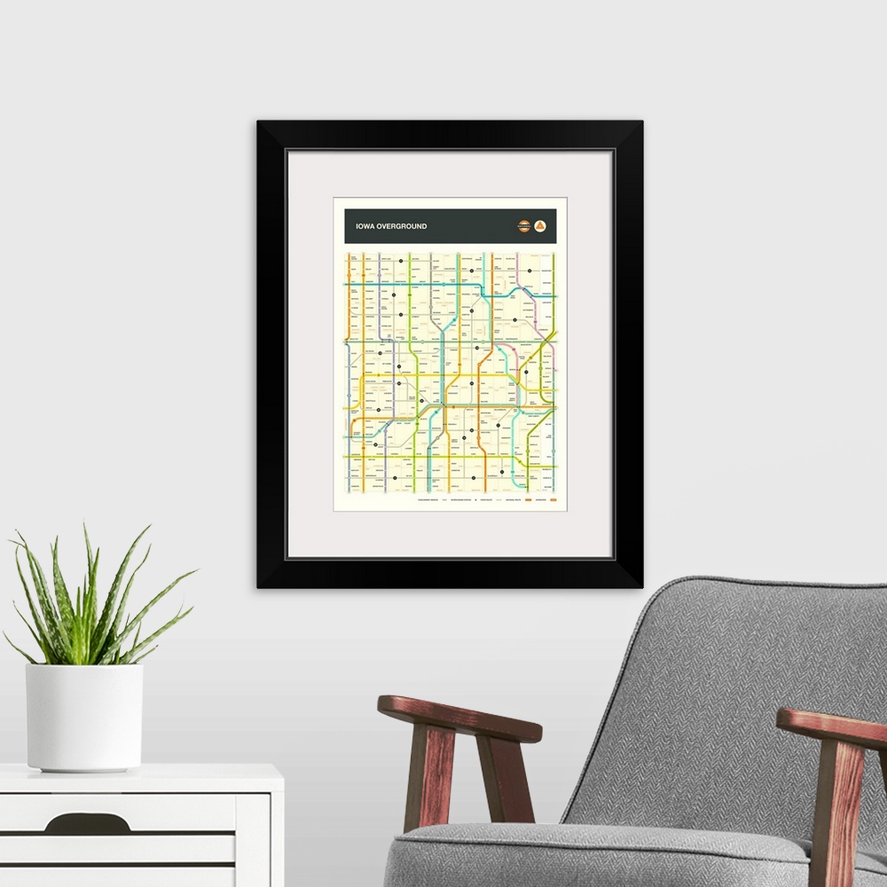 A modern room featuring Illustrated map of the Iowa state highways with labels and a key at the bottom.