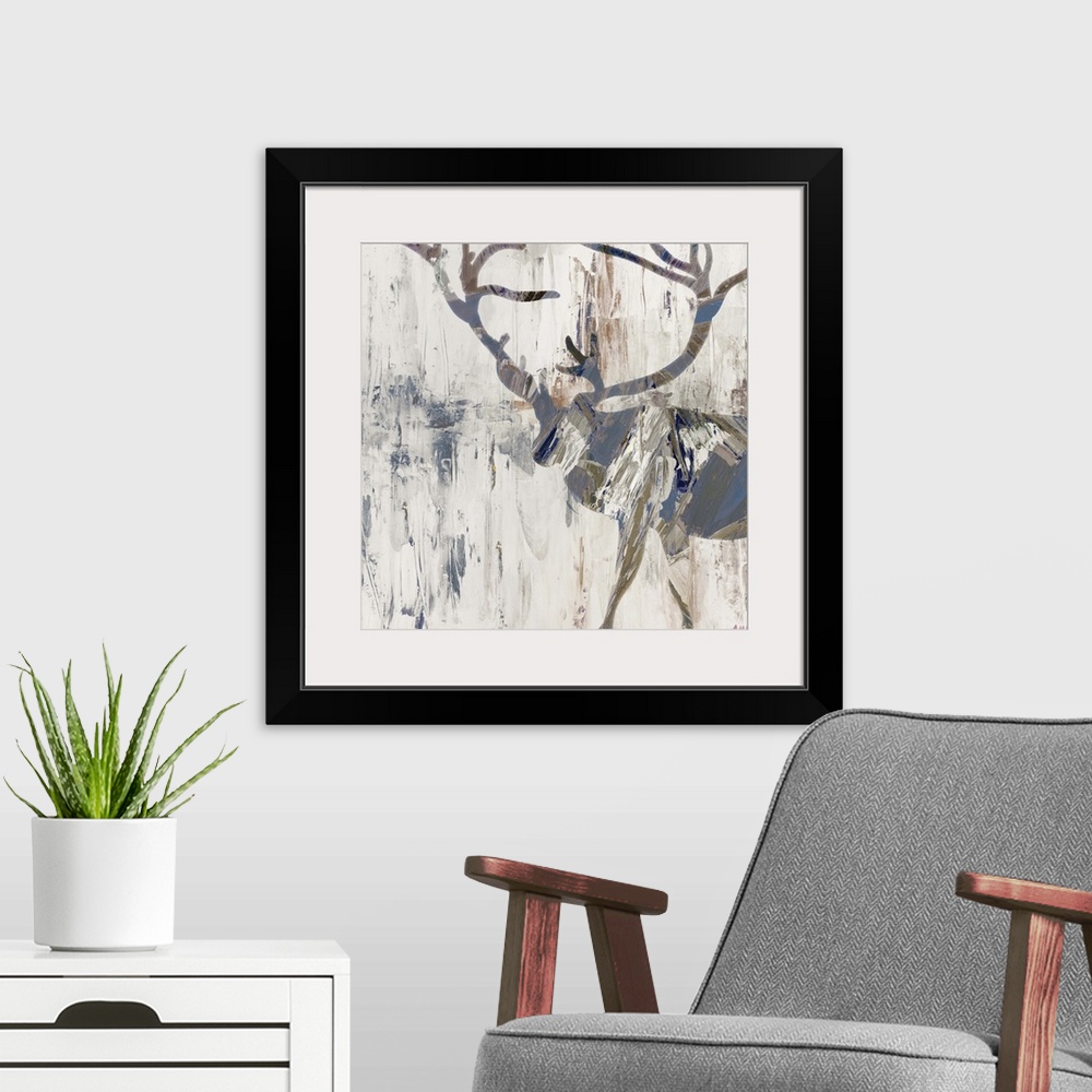 A modern room featuring Silhouette of a deer with large antlers in earth tones.