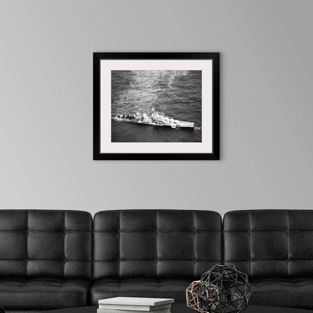 A modern room featuring Aerial view of the USS Reno after being torpedoed, photographed alongside the USS Zuni, 5 Novembe...