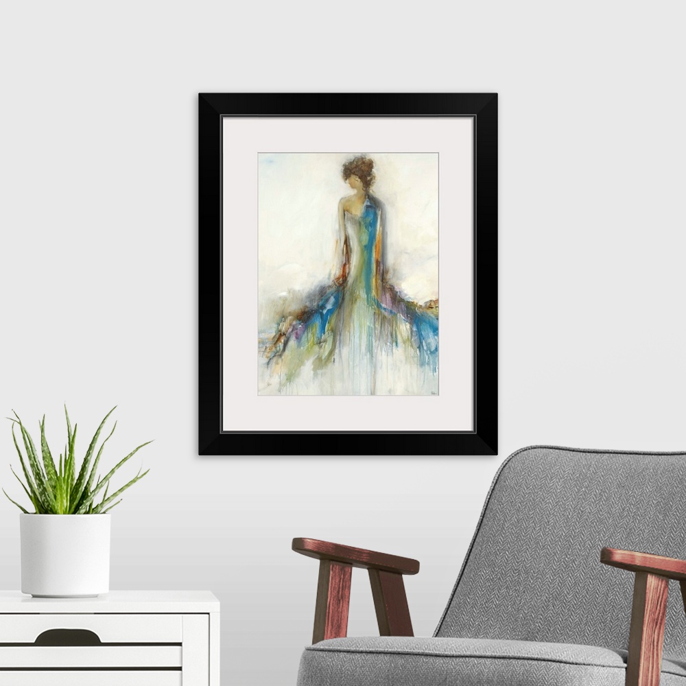 A modern room featuring Abstract portrait of the back of a woman with a long, colorful, flowing dress with the hues dripp...