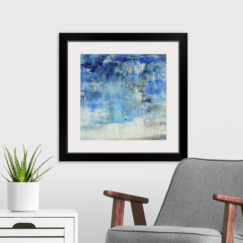 A modern room featuring Contemporary abstract painting using predominantly blue against neutral tones.