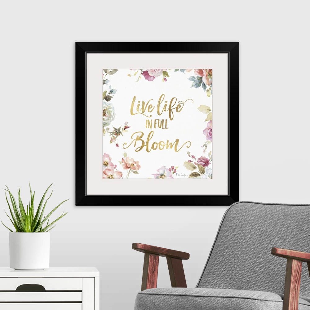 A modern room featuring "Live Life in Full Bloom" written in gold  and surrounded by a watercolor floral print.