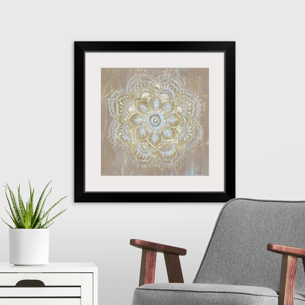 A modern room featuring Square decorative artwork of a Mandala style circle on a textured brown background.