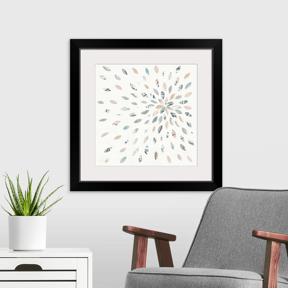 A modern room featuring Square watercolor painting with oblong shaped pieces creating a starburst firework design.