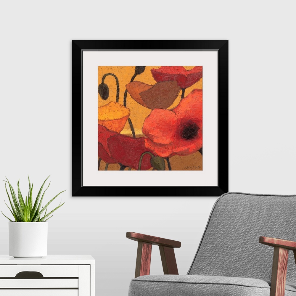 A modern room featuring Contemporary artwork of different brightly colored flowers close-up in the frame of the image.