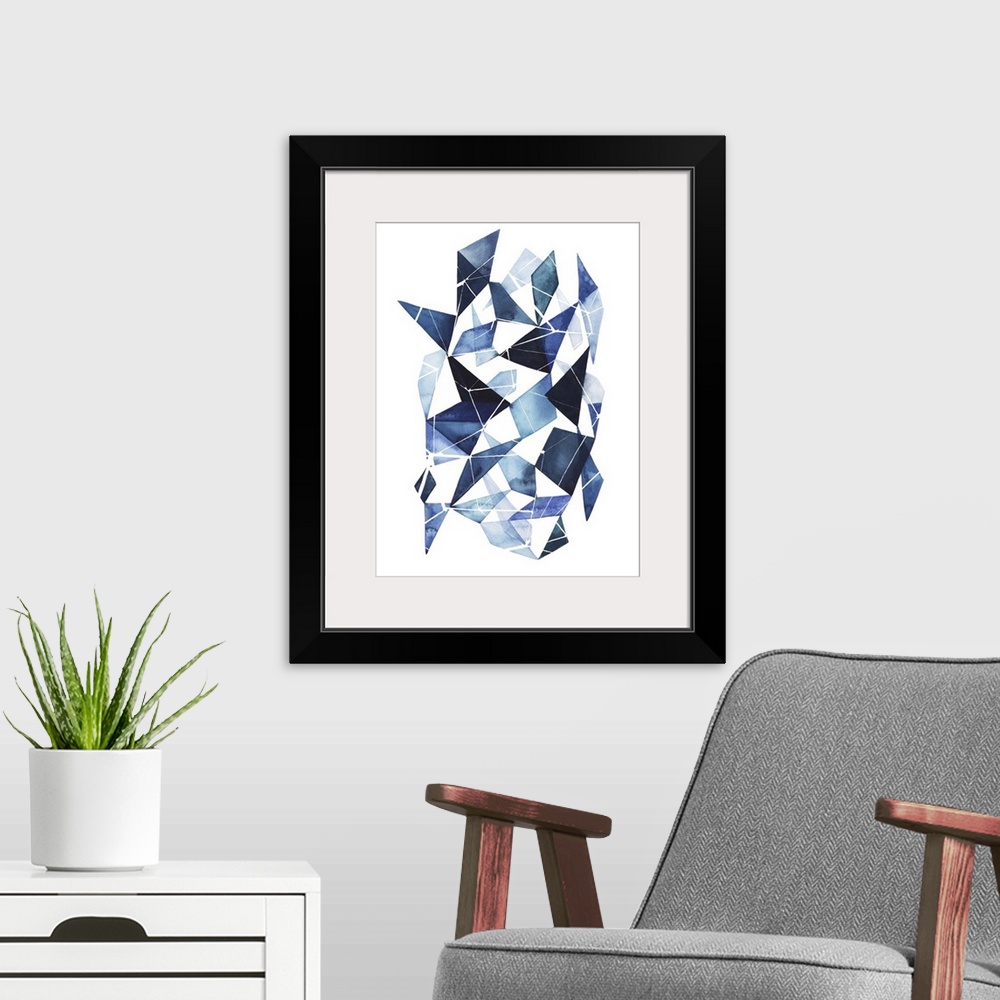 A modern room featuring Abstract watercolor geometric artwork in shades of blue.